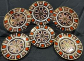 A set of three Royal Crown Derby Imari 1128 pattern side plates, 21.5cm diameter, first quality; a