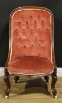 A Victorian walnut drawing room chair, stuffed-over upholstery, cabriole forelegs, ceramic