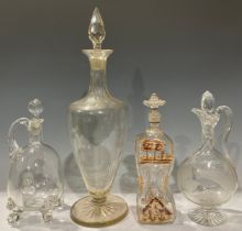 A large 19th century glass ovoid pedestal decanter, pointed prismatic stopper, star-cut base, 55cm