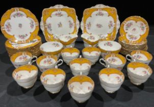 A Paragon tea set, comprising pair of sandwich plates, twelve cups, saucers and tea plates, two