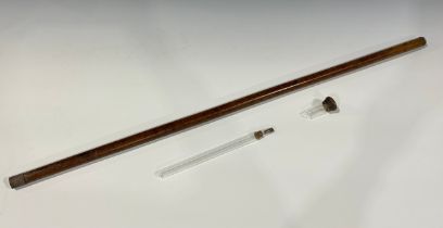 An Edwardian ramblers faux molacca cane, the screw top handle enclosing a spirit phial and