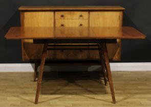 A retro mid-20th century walnut extending dining table, by Everest, 74.5cm high, 105.5cm extending