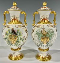 A pair of Royal Crown Derby two handled pedestal baluster vases and covers, printed and painted with