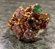 A diamond, ruby, sapphire and emerald multi-stone dress ring, set with three round brilliant cut