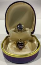 A 9ct gold mounted Derbyshire Blue John ring, single oval polished cabochon, size R, marked 375,