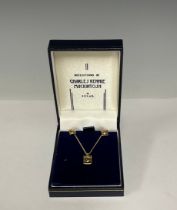 A 9ct gold "Reflections of Charles Rennie Mackintosh" by Solar pendant necklace and earrings