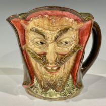 A Royal Doulton 'Mephistopheles' character jug, the base bearing the verse 'When the devil was sick,