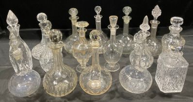 Glassware - a collection of cut glass decanters, various shapes, some with associated stopper, early