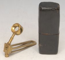 A 19th century brass pocket field microscope, folding for travel, 6.5cm long, cased