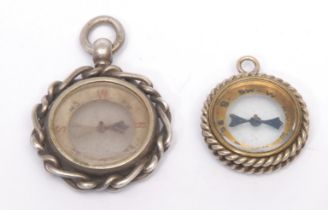 A Victorian silver compass watch fob, rope-twist border, 3cm diam, Birmingham 1899; another (2)