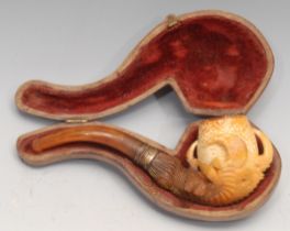 A German meerschaum pipe, carved as a dragon's claws, 12cm wide, early 20th century, cased