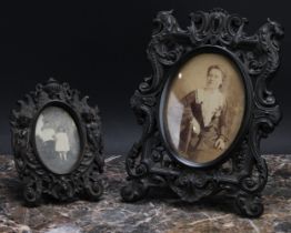 A 19th century bois durci easel photograph frame, in the renaissance revival taste, 25cm high, c.