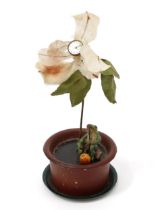 A Continental cold painted metal mystery clock type novelty timepiece, as a flower in a pot, a 1.5cm