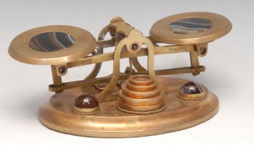 A set of Victorian gilt brass and banded agate letter balance postal scales, 17.5cm wide, c.1870