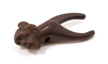 Nutcrackers - a Black Forest lever-action novelty nut cracker, carved as the head of a monkey, 18.