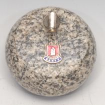 An early 20th century Scottish granite novelty desk weight, as a curling stone, applied with an