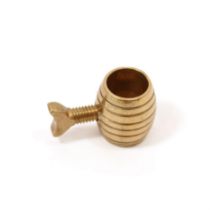 Nutcrackers - a 19th century brass barrel shaped screw-action pocket nut cracker, 3.5cm wide