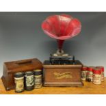 An early 20th century phonograph, The Columbia Gramophone, red painted tin horn, oak case, 31cm
