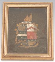 Heraldry - a 19th century coach or carriage panel, painted in polychrome with the arms of Graham