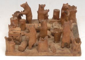 A Black Forest tableau, of bears at work in a woodyard, 13.5cm wide, c.1900