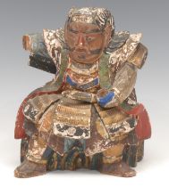 A Japanese polychrome carving, of a samurai, 19cm high, Meiji period