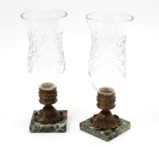 A pair of French bronze, verde antico marble and clear glass storm shade candle lanterns or lamps,