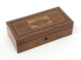 A 19th century Tunbridgware and rosewood rectangular sewing box, hinged cover inlaid with a