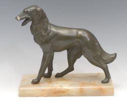 French Art Deco School, a verdigis patinated spelter model, of a dog, rectangular onyx base, 20.