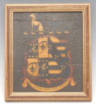 Heraldry - a 19th century coach or carriage panel, painted in polychrome with the arms and motto