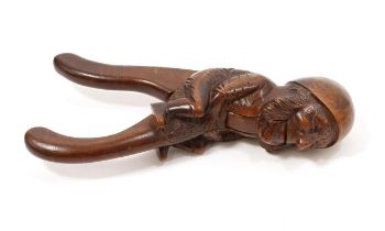 Nutcrackers - a Black Forest lever-action novelty nut cracker, carved as a gnome, full length,
