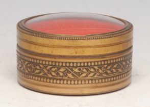 A Continental gilt metal circular snuff box, the push-fitting cover mounted with an intaglio