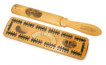 Treen - a Mauchline ware cribbage board, transfer printed with fanned playing cards, and named views