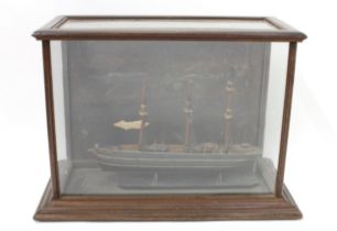 An early 20th century model ship, Cutty Sark, glazed mahogany case, 41cm high, 58cm wide