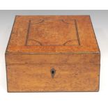 A George III burr maple rectangular gentleman's dressing box, hinged cover enclosing a folding