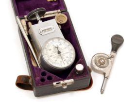 A Dr Horn's patent revolution counter, by George Thomas & Co Ltd, Manchester, 6cm register, cased;