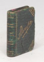 A late Victorian/Edwardian tooled and gilt morocco leather novelty stamp case, as a book, 3.5cm