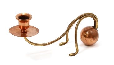 An Arts and Crafts brass and copper counter-balance candlestick, attributed to W A S Benson, campana