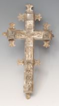 A 19th century Middle-Eastern mother of pearl Corpus Christi, carved and engraved with the crucified