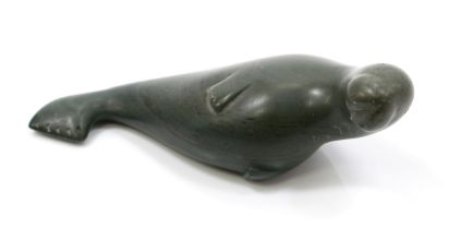 An Inuit stone carving, of a seal, 13.5cm long, Canadian Eskimo Art label