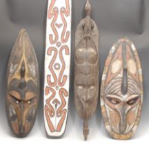 Tribal Art and the Eclectic Interior - a Papua New Guinea gope board or kwoi, carved in relief