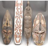 Tribal Art and the Eclectic Interior - a Papua New Guinea gope board or kwoi, carved in relief