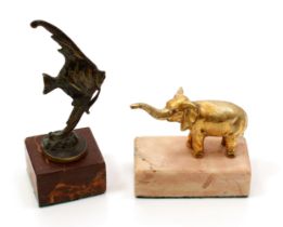 A Continental gilt cabinet model, of an elephant, rectangular marble base, 6.5cm long; another, of a