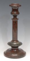 A late 19th century Cornish serpentine candlestick, campana sconce, 31cm high, c.1890