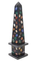 A Grand Tour style pietra dura library obelisk, inlaid with egg shaped reserves of lapis lazuli,