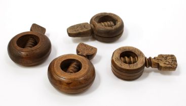 Nutcrackers - a 19th century boxwood ring shaped screw-action pocket nut cracker, 5.5cm diam;