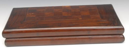 A 19th century yew and parquetry rectangular games box, the folding chess board enclosing an