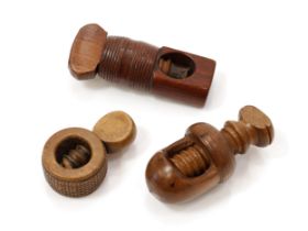 Nutcrackers - a 19th century boxwood ring shaped screw-action pocket nut cracker, chequered