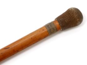 A 19th century walking stick, possibly sailor work, knotted hemp pommel, malacca cane, old ink MS.
