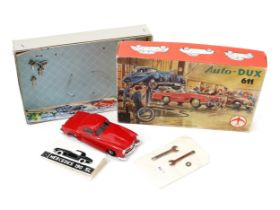 An Auto-Dux (West German) 611 plastic and clockwork Mercedes 190 SL construction kit, red body,