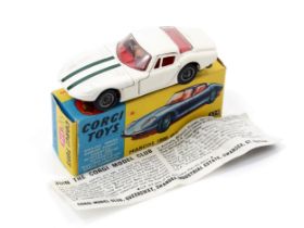 Corgi Toys 324 Marcos 1800 G.T. with Volvo engine, white body with dark green stripes to bonnet, red